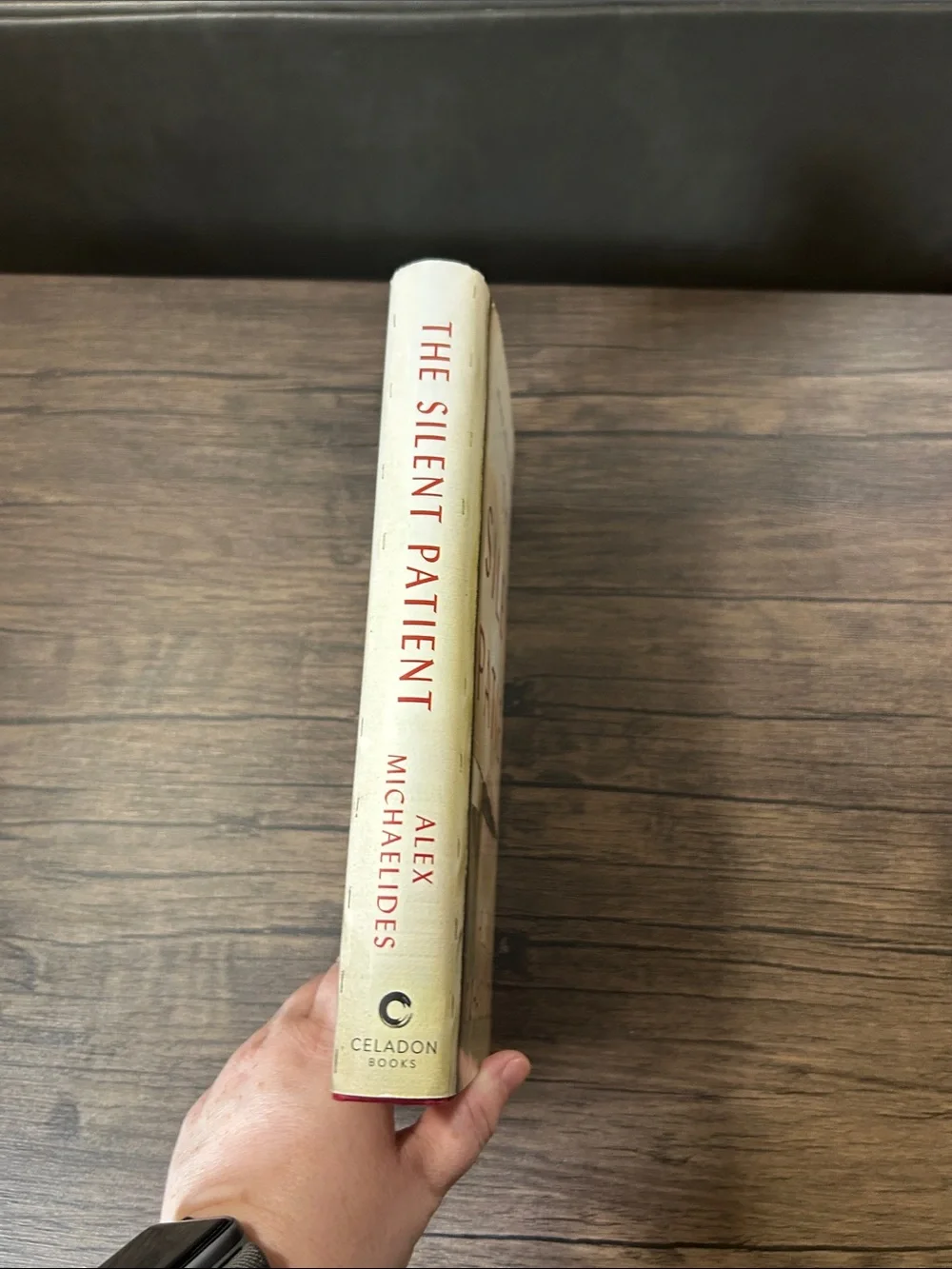 The Silent Patient by Alex Michaelides Hardcover Book - Cream with Red Text